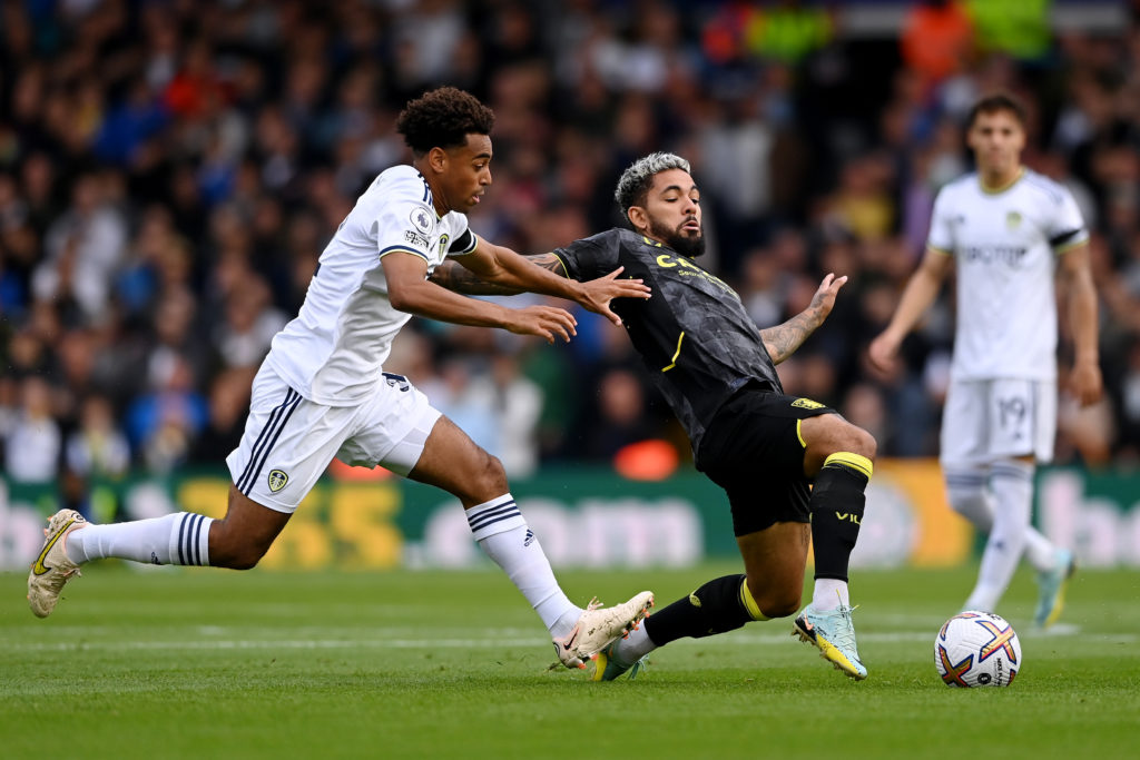 Douglas Luiz takes on Tyler Adams during his time at Leeds.