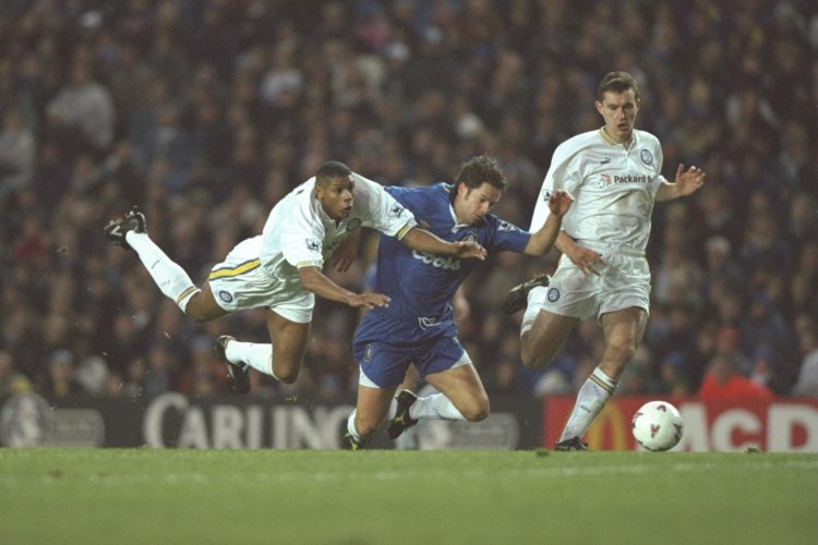 1 Dec 1996:  (left-right) Carlton Palmer of Leeds is upended as he challenges Scott Minto of Chelsea, David Wetherall of Leeds gives chase. During ...