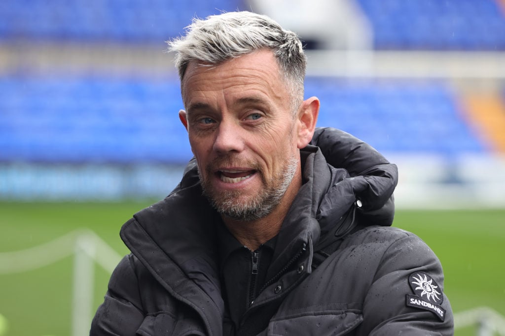 Pundit Lee Hendrie during a League Two match.