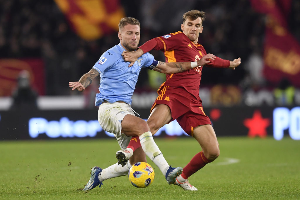 Ciro Immobile of SS Lazio and Diego Llorente of AS Roma