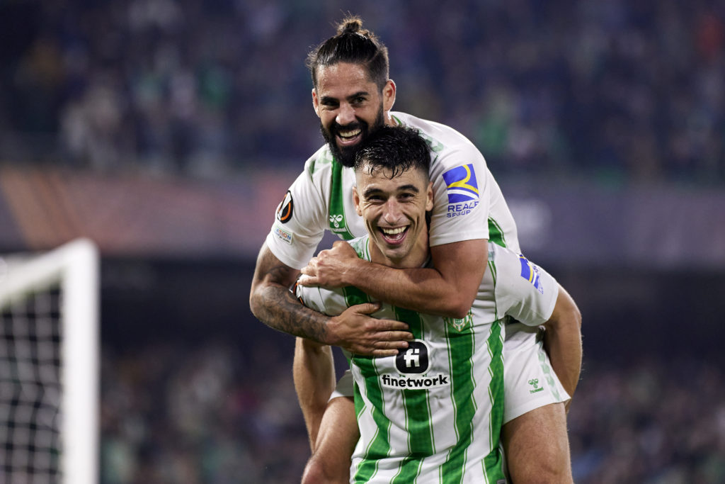 Isco celebrates with Leeds flop Marc Roca, at Real Betis.