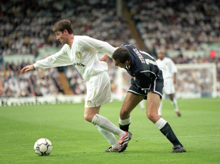 9 Aug 2000:  Michael Bridges of Leeds United holds off Martin Stranzi of TSV 1860 Munich during the European Champions League Qualifying Round Firs...