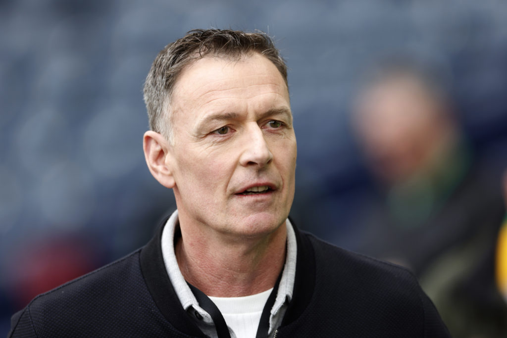 Chris Sutton on punditry duty during an Old Firm game.