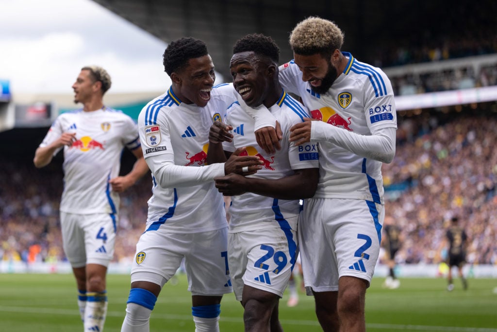 Willy Gnonto, Largie Ramazani and Jayden Bogle celebrate.