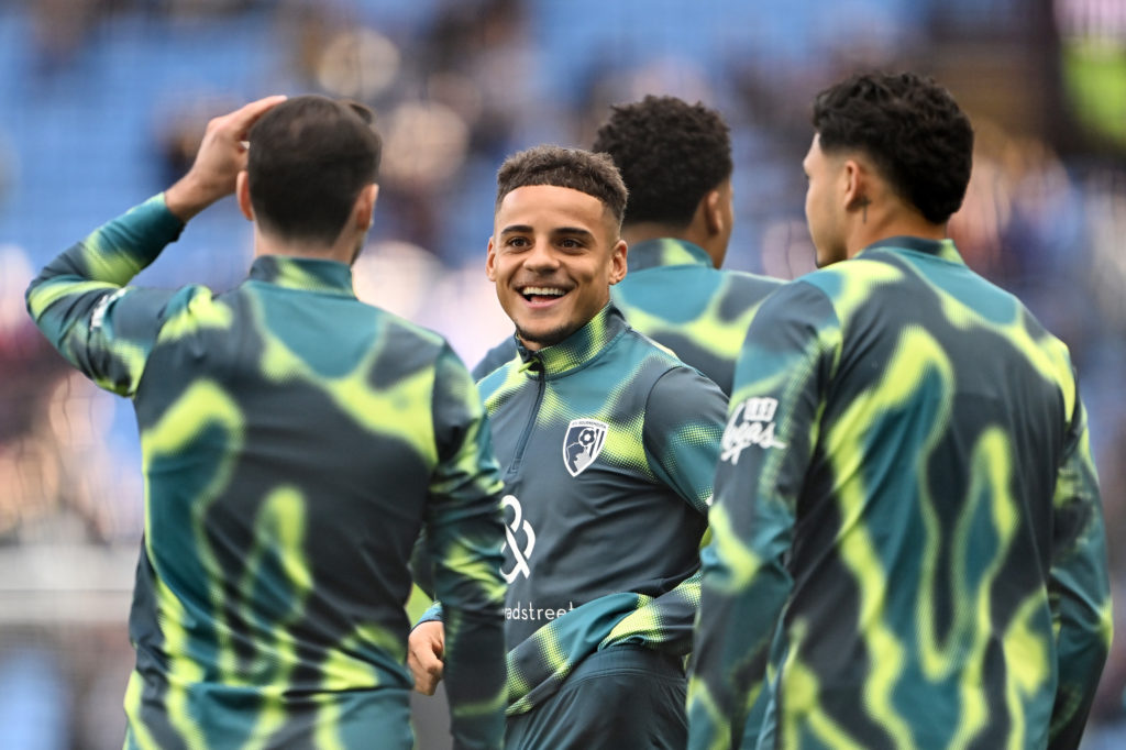 Max Aarons warms up for Bournemouth ahead of a clash against Aston Villa.