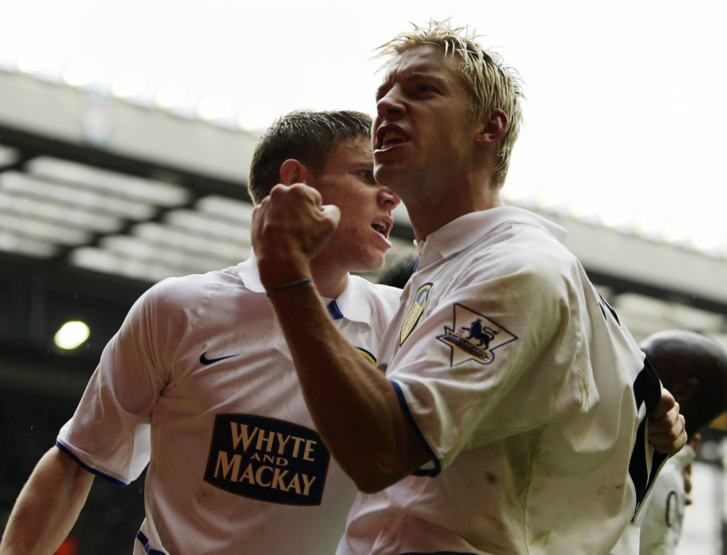 Alan Smith celebrates after scoring