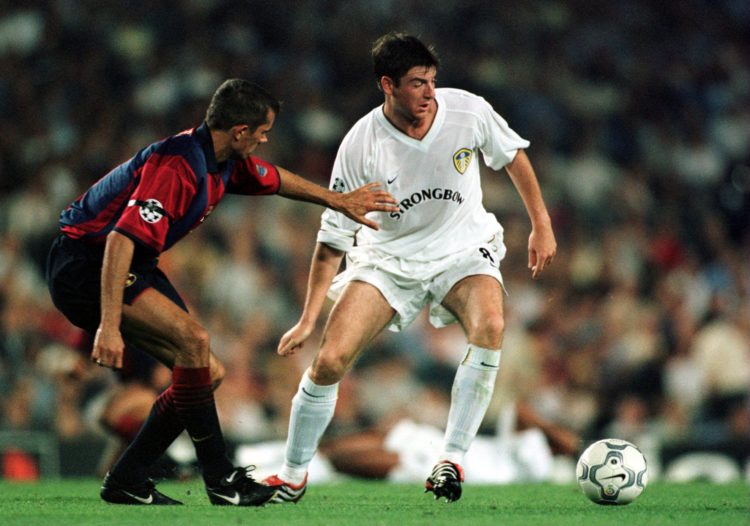 13 Sep 2000:   Phillip Cocu of Barcelona tries to tackle Michael Bridges of Leeds during the Champions League first round match between Barcelona a...
