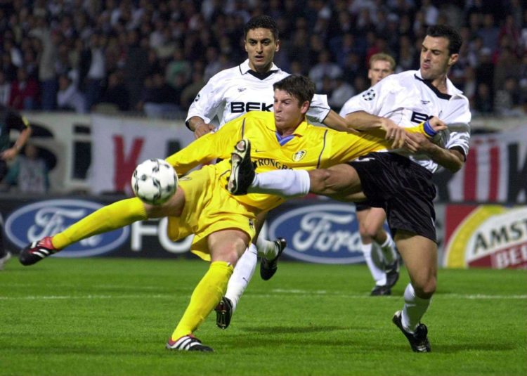 18 Oct 2000:  Michael Bridges of Leeds United gets in a shot while challenged by Havutchu Tayfur of Besiktas during the Besiktas v Leeds United Cha...
