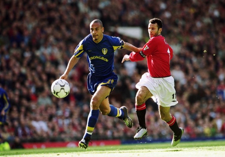 28 Oct 2001:  Rio Ferdinand of Leeds gets the better of Man Utd's Ryan Giggs during the FA Barclaycard Premiership match between Manchester United ...