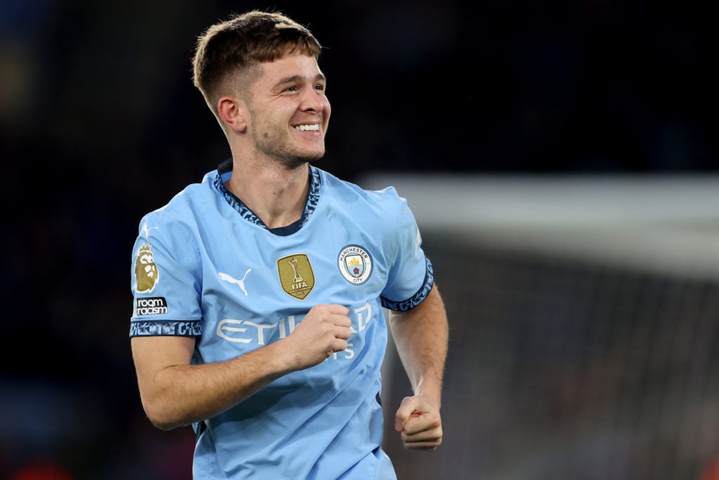 James McAtee has a big smile on his face while playing for Manchester City against Leicester City.