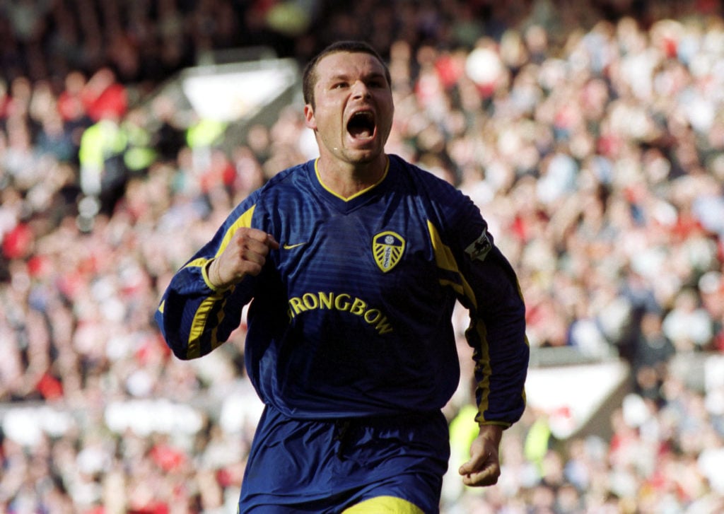 Mark Viduka celebrates scoring for Leeds United against Man United.