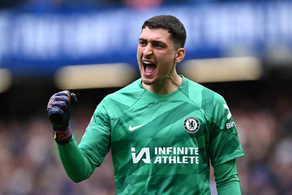 Djordje Petrovic of Chelsea celebrates his team's fourth goal scored by teammate Nicolas Jackson during the Premier League match between Chelsea FC and West Ham United at Stamford Bridge.