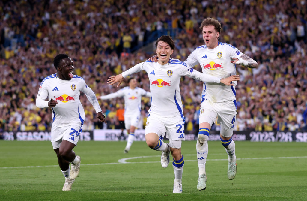 Ao Tanaka celebrates his goal with Joe Rodon and Willy Gnonto.