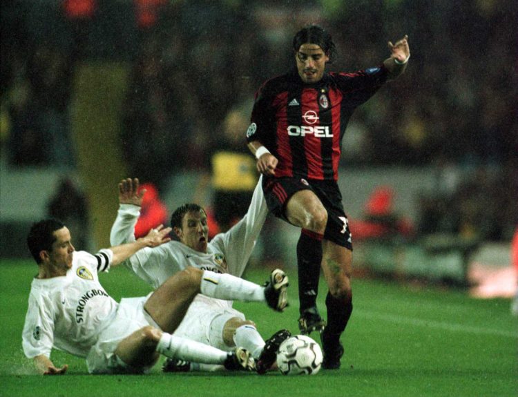 19 Sep 2000: (Left to Right) Gary Kelly and Lee Bowyer of Leeds United both try to tackle Francesco Coco of AC Milan during the match between Leeds...