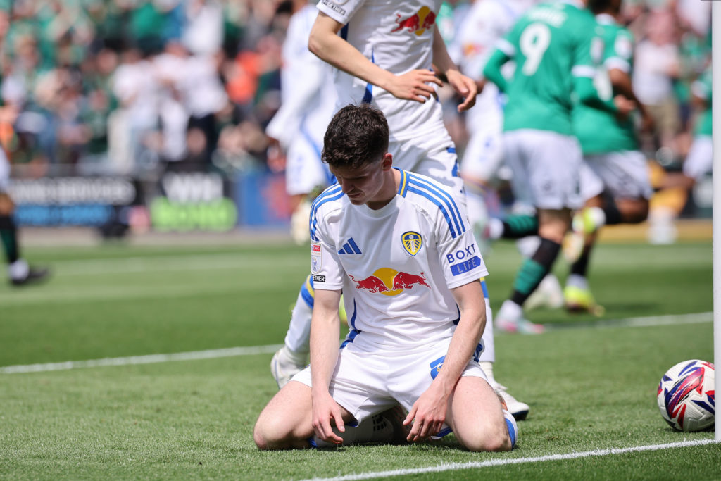 Sam Byram looks dejected on his knees after scoring an own goal.