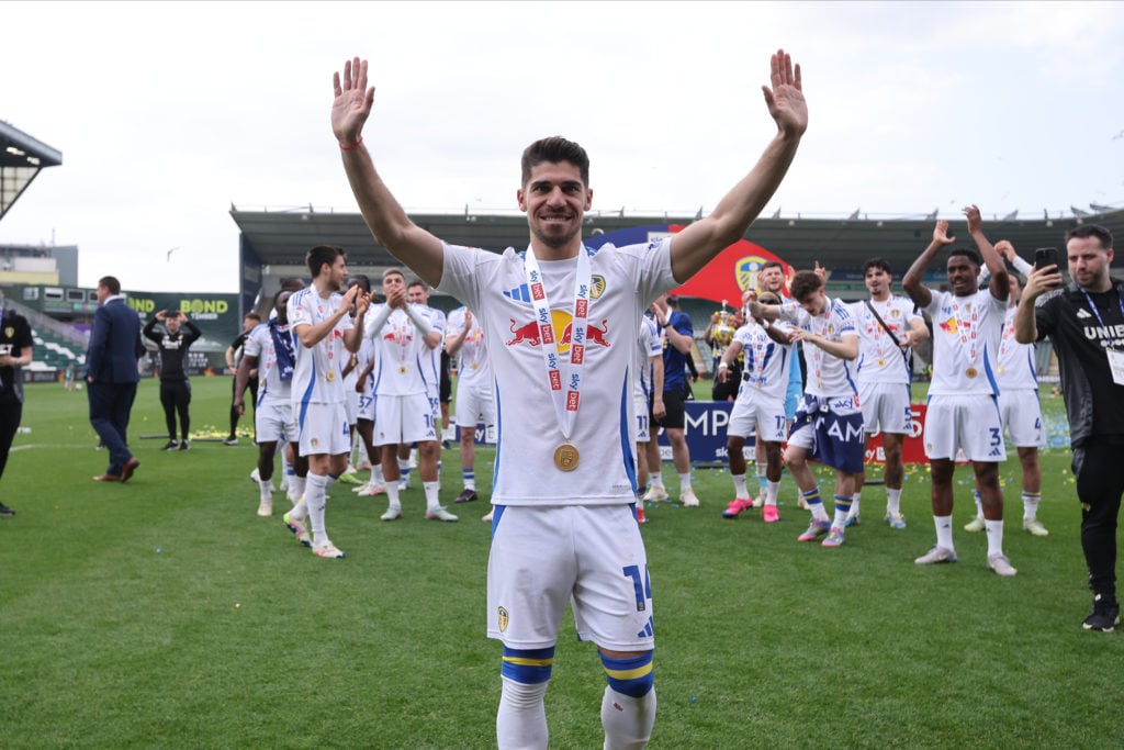 Manor Solomon celebrates Leeds' Championship title win at Plymouth.