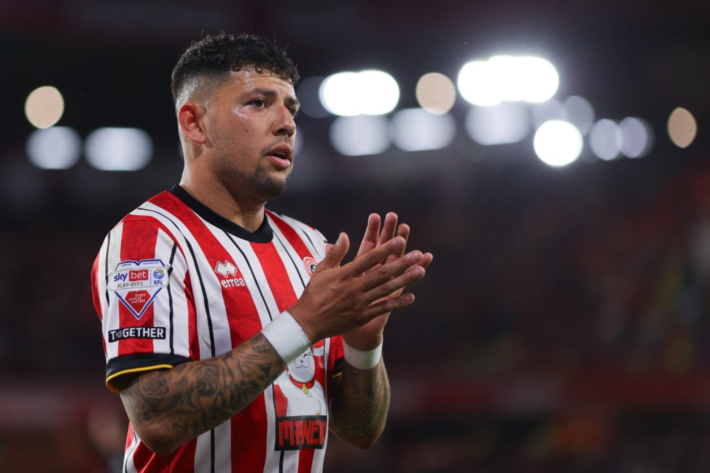 Gustavo Hamer applauds Sheffield United fans.