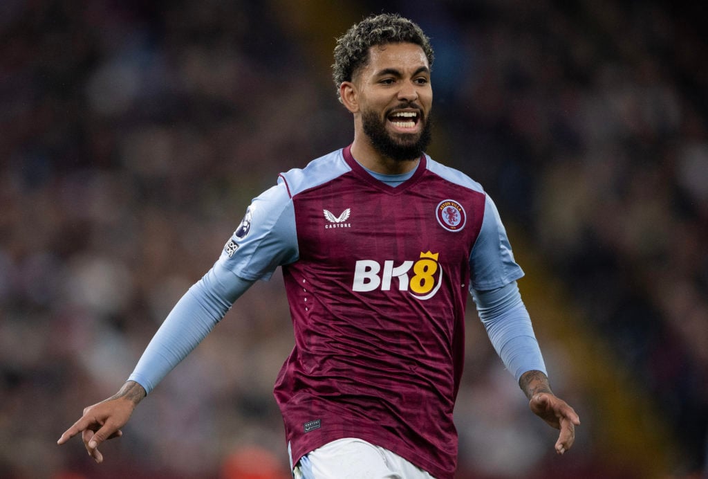 Douglas Luiz playing in a Premier League game for Aston Villa.