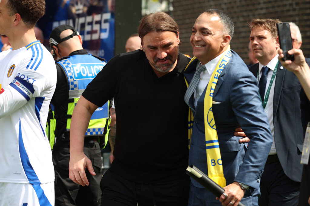 Daniel Farke and Paraag Marathe celebrate the Championship trophy.