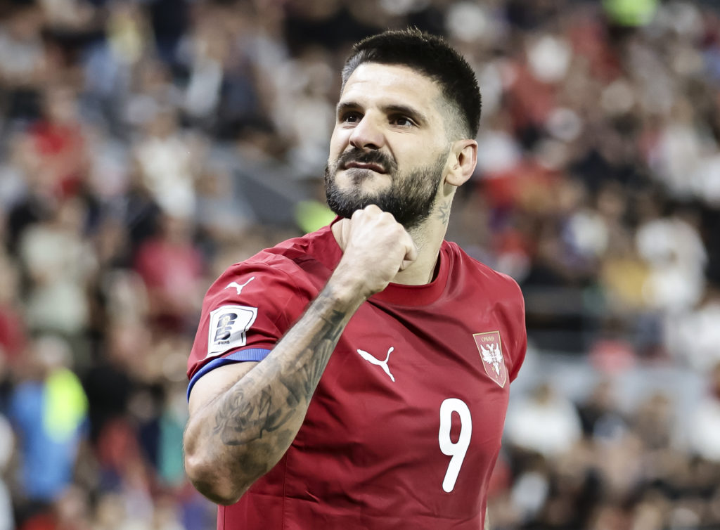 Aleksandar Mitrovic celebrates scoring a goal for Serbia against Andorra.