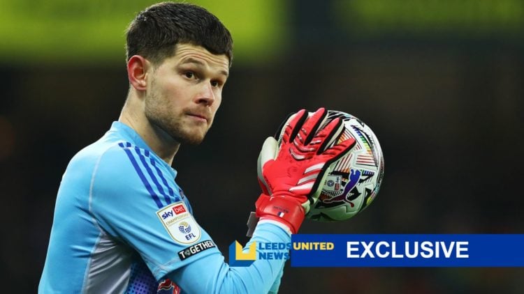 Illan Meslier of Leeds United with LUN exclusive banner