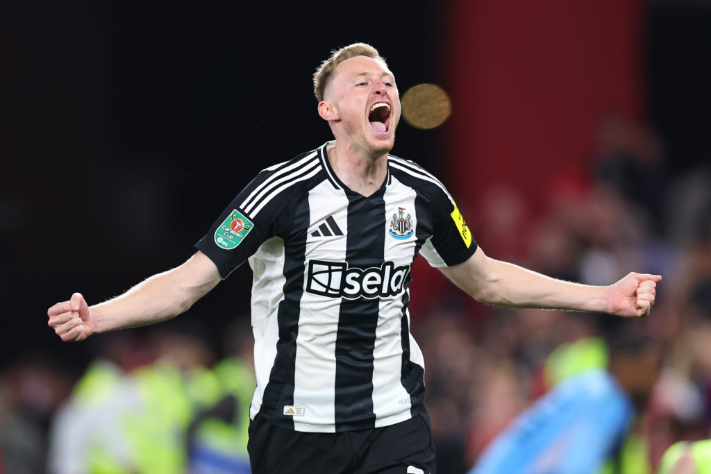 Sean Longstaff celebrates Newcastle United's Carabao Cup win over Nottingham Forest.