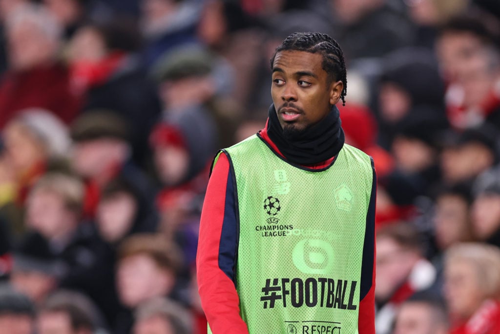 Angel Gomes warms up during a clash between Lille and Liverpool.