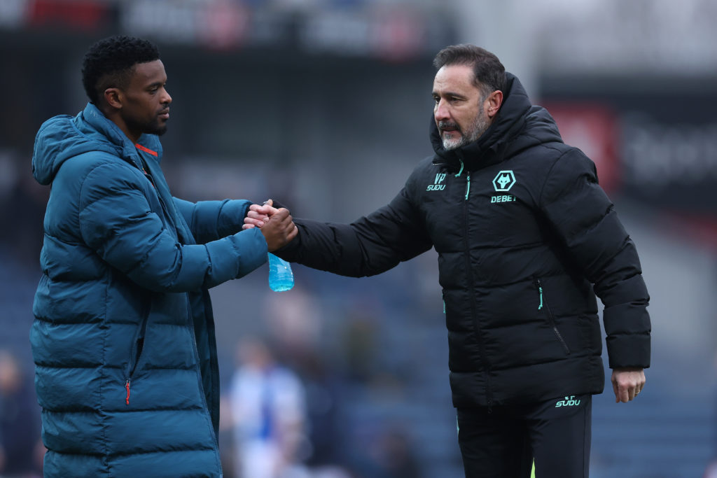Wolves manager Vitor Pereira and Nelson Semedo embrace.