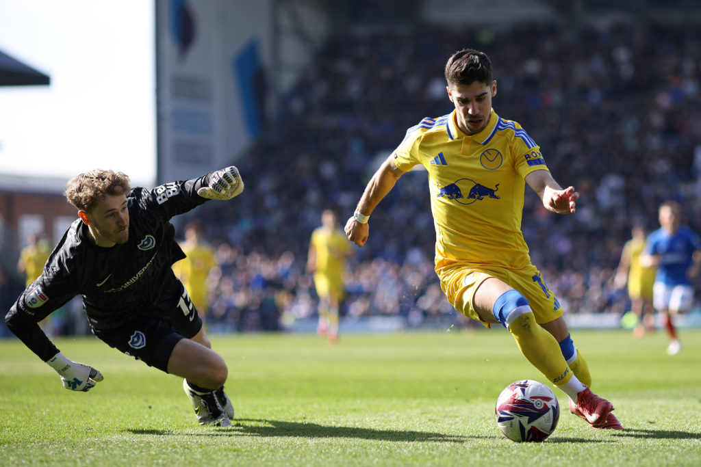 Manor Solomon tries to round the goalkeeper in Portsmouth vs Leeds United.