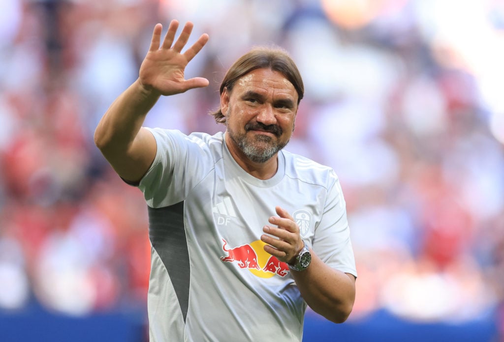 Daniel Farke waves after Leeds United vs Manchester United.