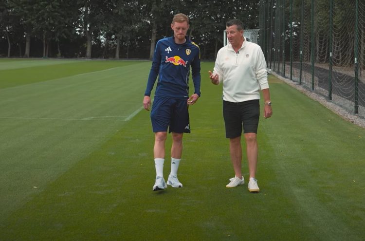 Sean Longstaff walks with Michael Bridges at Leeds United's training ground.
