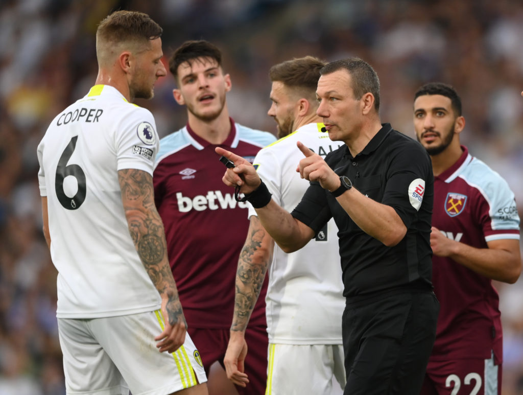 Referee Kevin Friend makes the VAR signal during the Premier League match between Leeds United and West Ham United.
