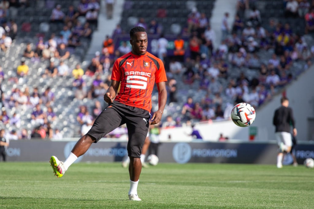 Arnaud Kalimuendo warms up ahead of Toulouse FC v Stade Rennais FC 1901 - Ligue 1 McDonald's