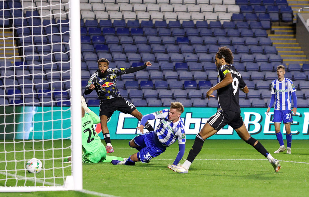 Jayden Bogle shoots into the bottom corner for Leeds United vs Sheffield Wednesday.
