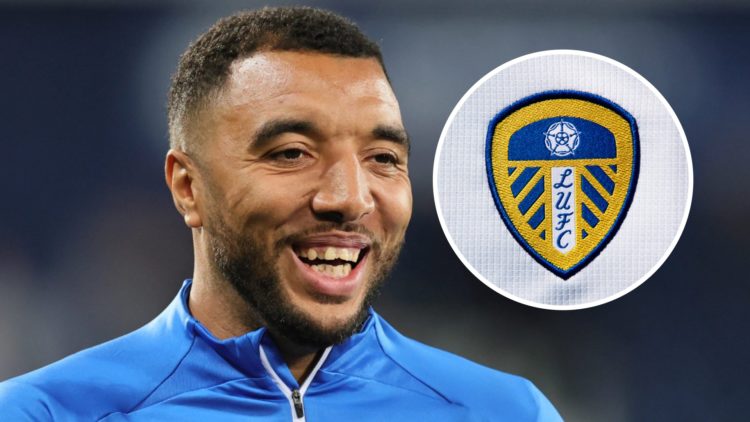 Pundit Troy Deeney with the Leeds United badge inset