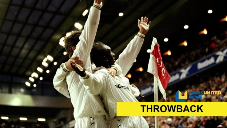 Jimmy Floyd Hasselbaink celebrates a goal for Leeds United with the throwback label and site logo