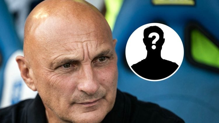 Lorient manager Olivier Pantaloni looks on.
