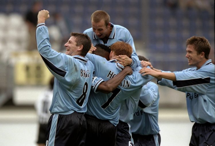 14 Sep 1999:  Leeds players celebrate Lucas Radebe's 38th minute goal during the match between Partizan Belgrade and Leeds United in the UEFA Cup F...