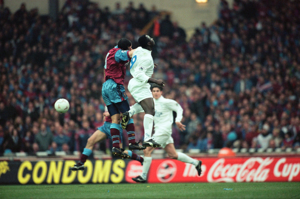 Tony Yeboah challenges for the ball during Aston Villa vs Leeds United in the League Cup final