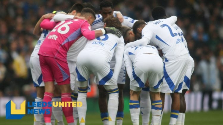 The Leeds United players huddle before a game.