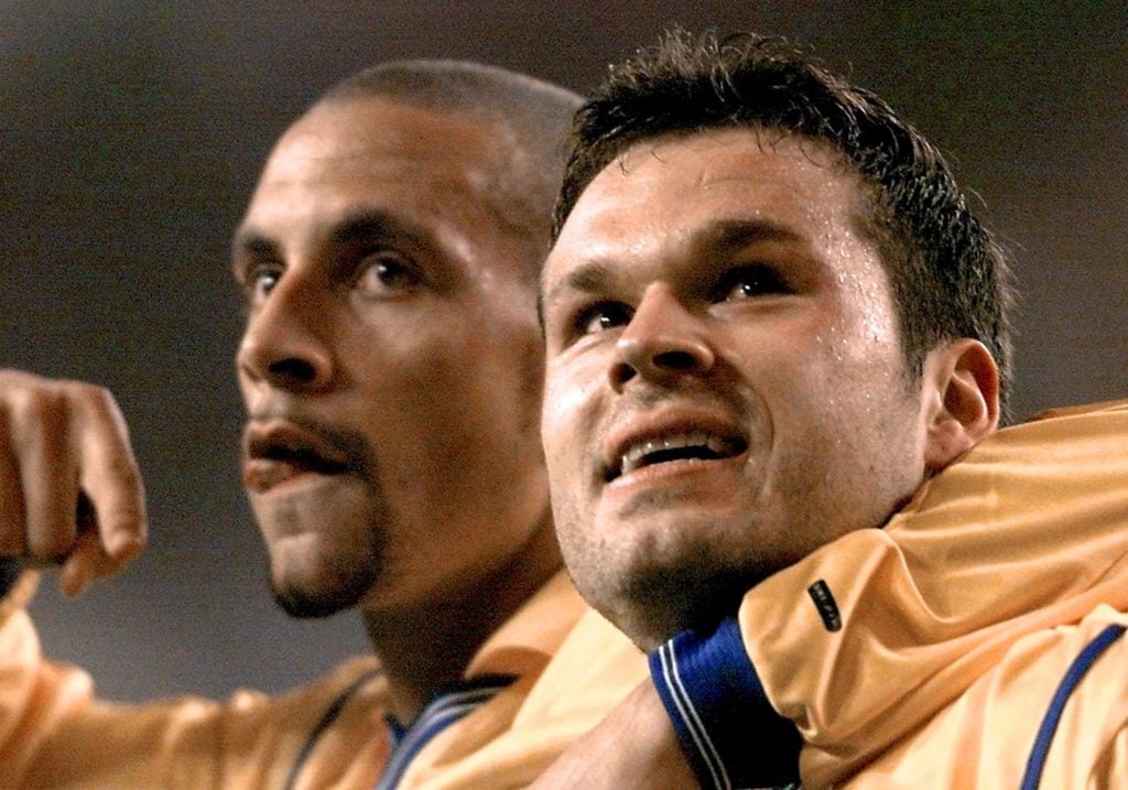 Rio Ferdinand and Mark Viduka in action for Leeds.