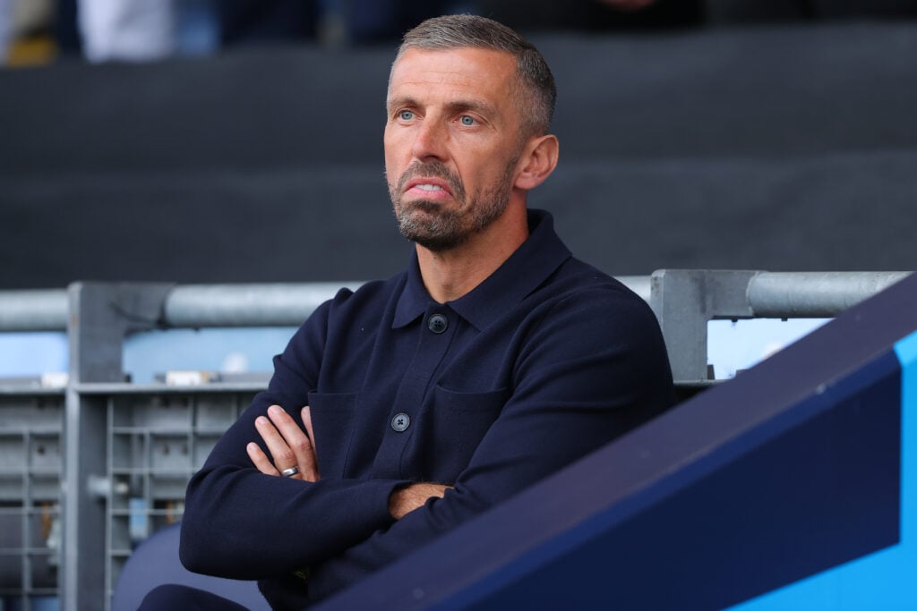 Gary O'Neill looks on at a Manchester City Training Session