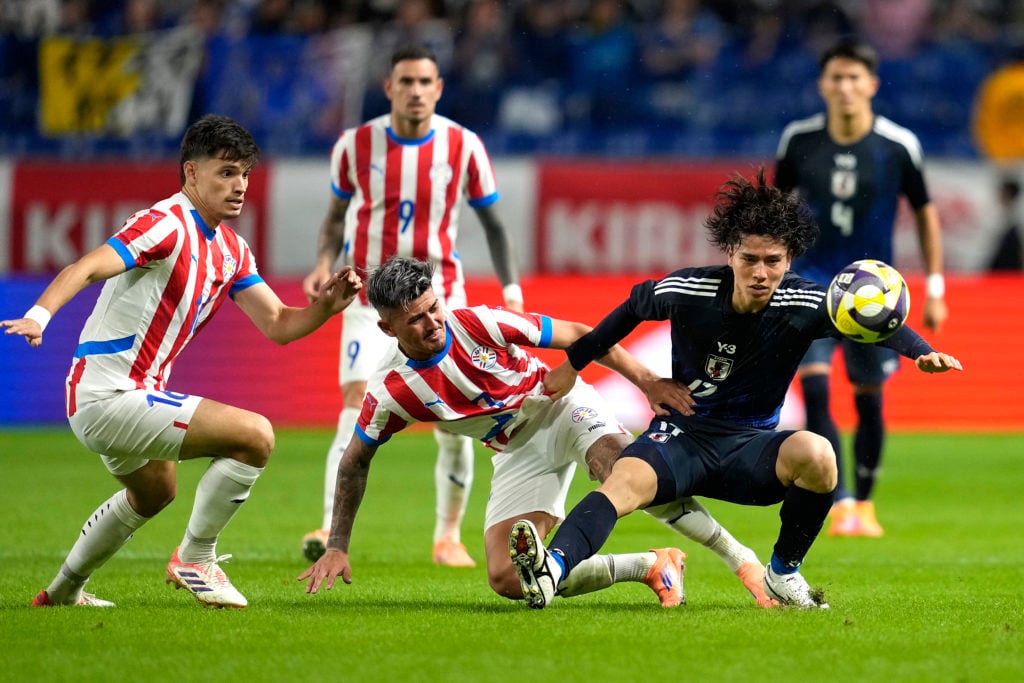 Ao Tanaka challenges for the ball during Japan v Paraguay - International Friendly