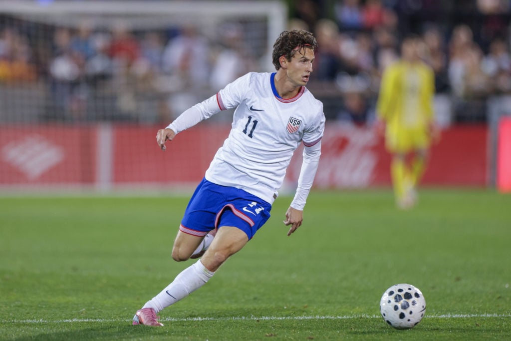 Brenden Aaronson in action for the United States against Australia.