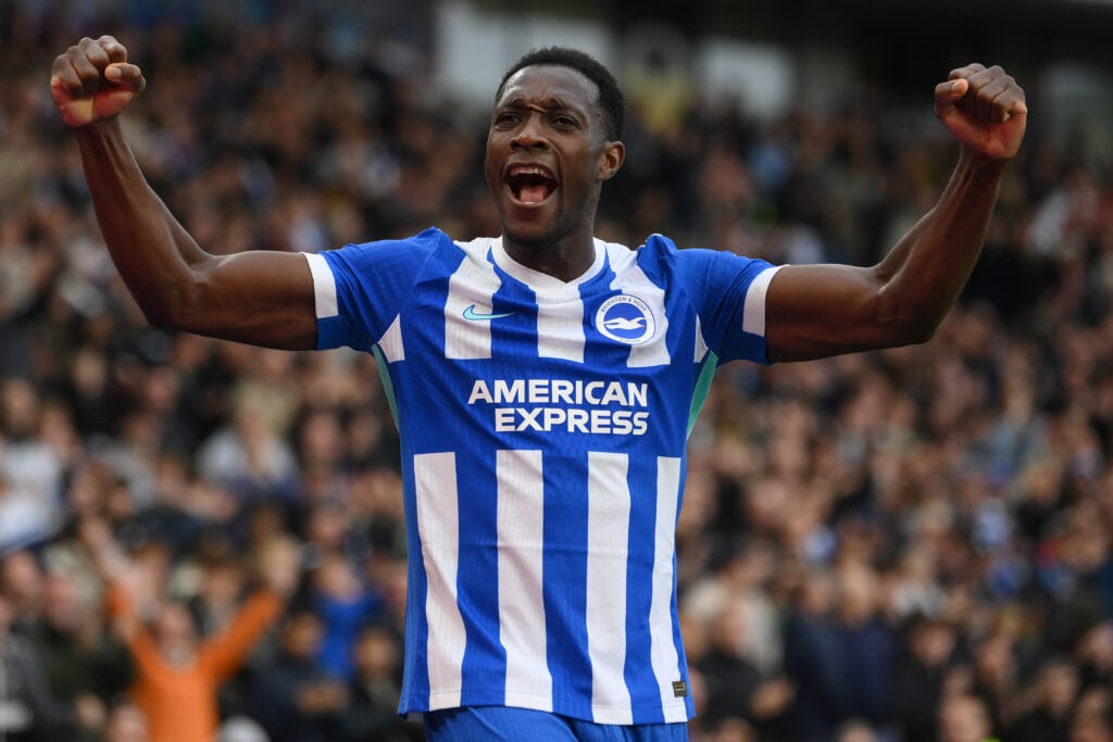 Danny Welbeck pumps his fists in celebration.
