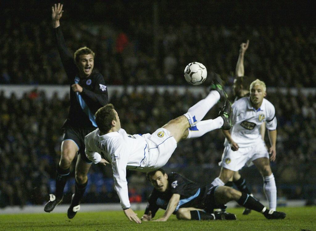 Mark Viduka scores during Leeds United v Leicester City