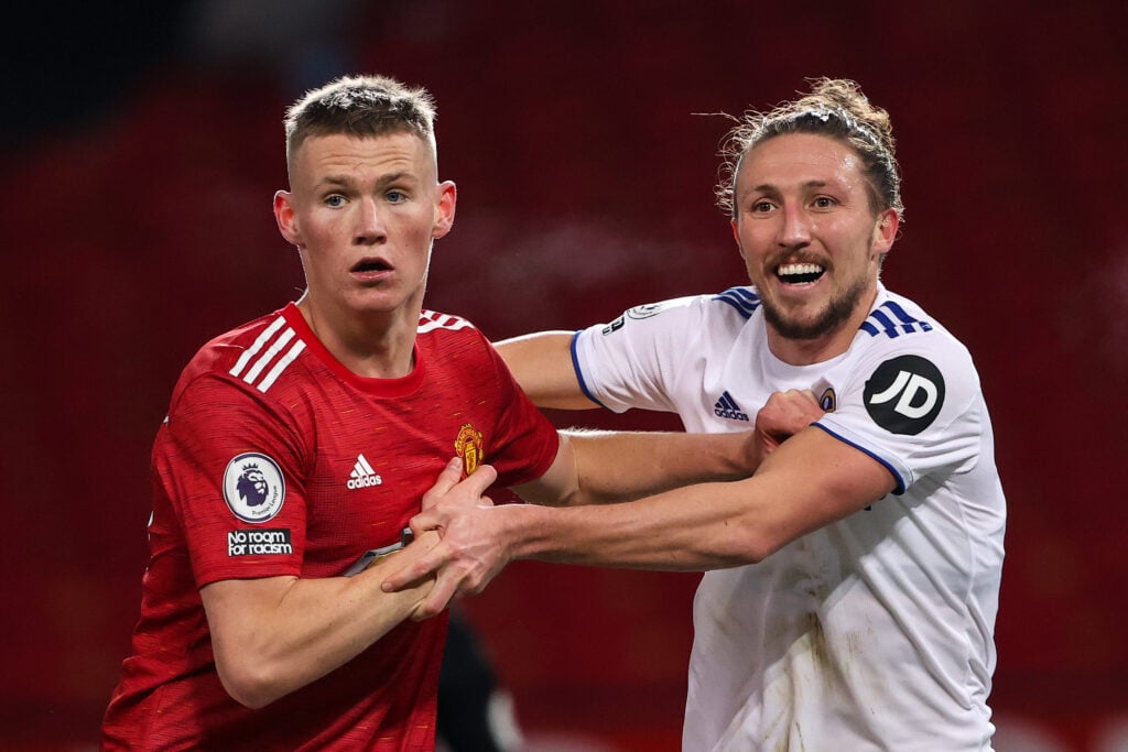 Scott McTominay and Luke Ayling during Manchester United v Leeds United - Premier League