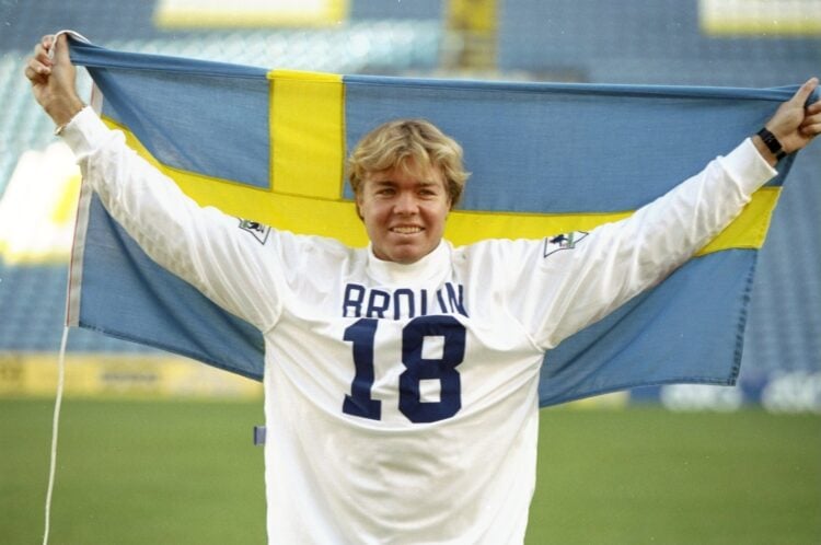18 Nov 1995:  Tomas Brolin of Leeds United holds up his national flag after signing for the club at Elland Road in Leeds, England.  Mandatory Credi...