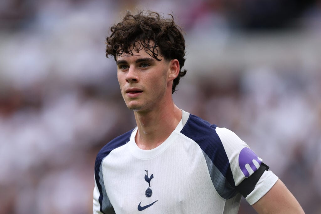 Archie Gray in action for Tottenham during a Premier League clash against Burnley
