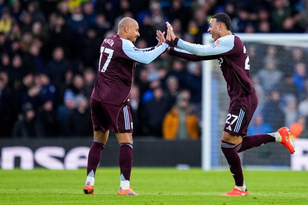 Donyell Malen celebrates Villa's equaliser.